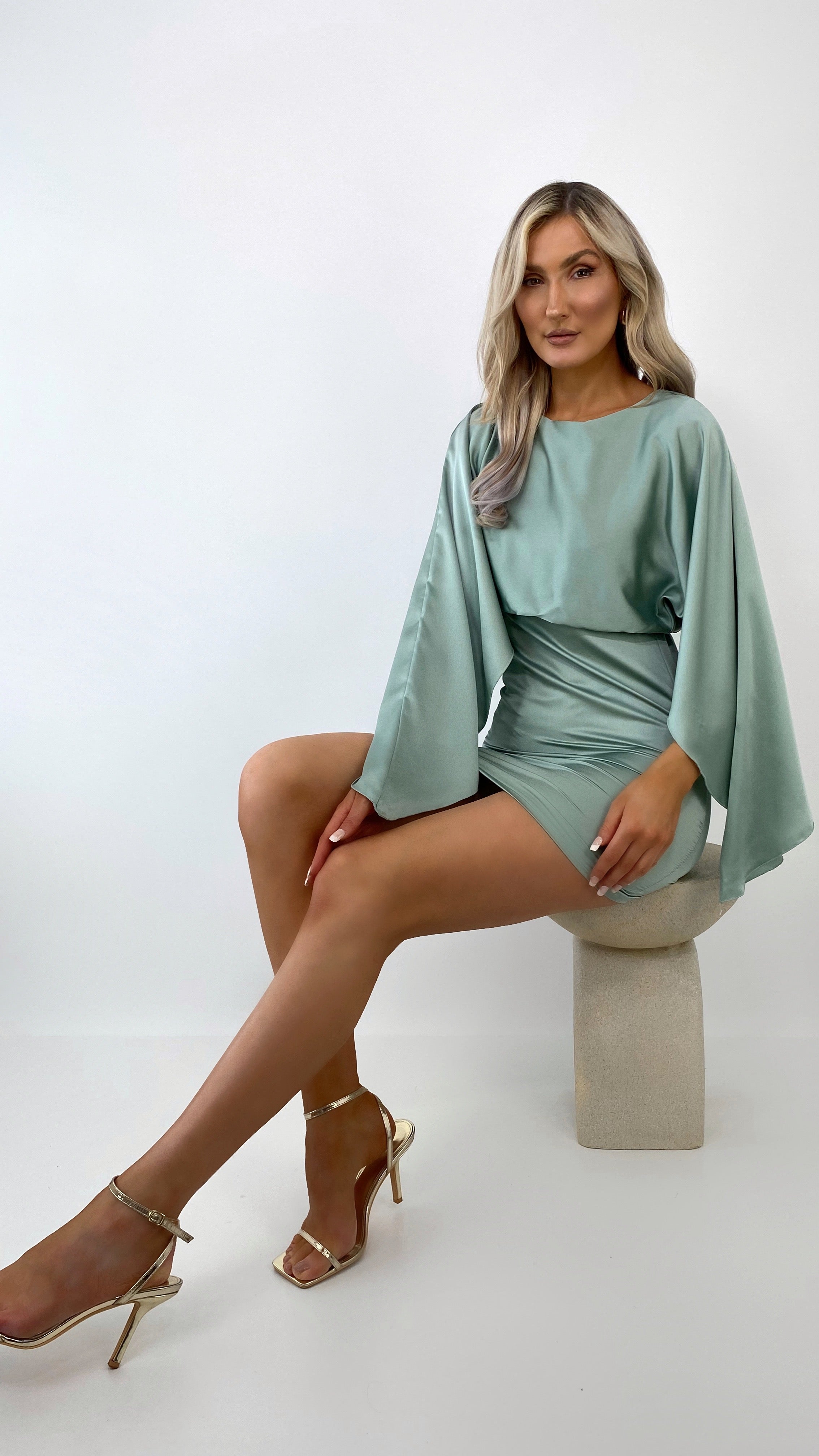 Hazell Satin Mini Dress with Long Bell Sleeves - Sage Green dresses.ie Hazell Satin Mini Dress with Long Bell Sleeves - Sage Green dresses.ie